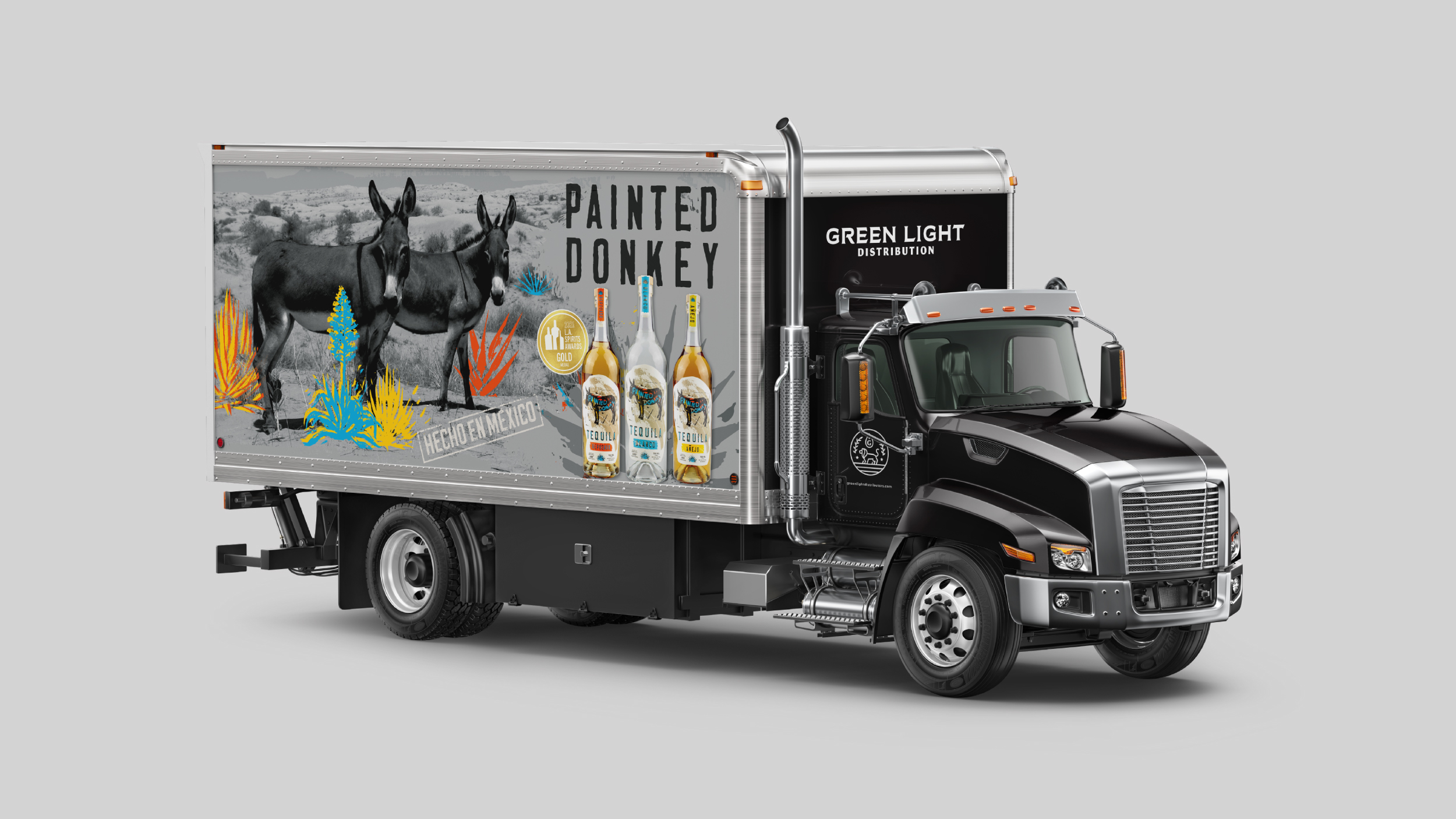 Painted Donkey graphics on the side of a distribution trailer vehicle 